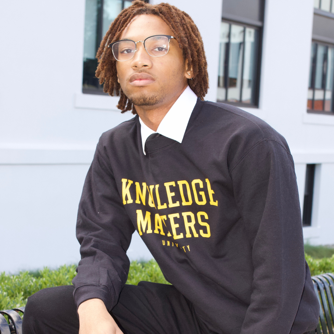 "Knowledge Matters" Black Sweatshirt with (Gold Print)